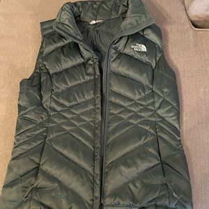 The North Face down vest. Size Medium. Like new condition.